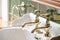 New luxury hotel vintage brass gold plated pillar taps in ensuite bathroom at wash basin