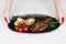 New meat meal presentation, white wooden backdrop