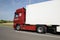 New Mercedes Actros truck in beautiful red colour. Mercedes Actros with trailer in motion