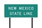 New Mexico State Line green road sign