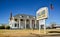 NEW MEXICO, USA - NOVEMBER 20, 2019: flag of America, information sign near the white crematorium building in New Mexico