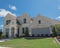 New model single-family house with American flag near Dallas, Texas