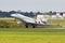 New modern Dassault Falcon 8X business jet plane taking off from the runway of Le Bourget airport to fly at Paris Air Show. France
