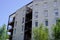 New modern facade white apartment building exterior balcony architecture in blue summer sky