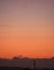 The new moon and Mercury with a silhouette of Tokyo Tower