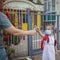 New normal back to school. Father passing her daughter in medical mask a sanitizer. Stay safe