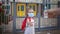 New normal back to school. Father passing her daughter in medical mask a sanitizer. Stay safe