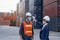 New normal concept,Engineer check the staff integrity by measuring the temperature,wear mask and helmet before working in factory