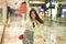 New normal habits - young attractive and happy Asian Japanese woman at shopping mall happy and excited enjoying sale in beauty