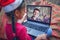 New normal online Christmas celebration. Kids celebrating with family via video chat