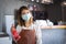 New normal startup small business Portrait of Asian woman barista wearing protection mask