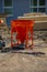 New orange concrete bomb standing on an construction site