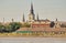 New Orleans famous church spires of the Cathedral Basilica of Saint Louis from Mississippi River under sunny blue sky in the