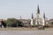 New Orleans famous church spires of the Cathedral Basilica of Saint Louis from Mississippi River under sunny blue sky in the