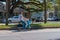 New Orleans, LA/USA - 3/6/20: Man Riding Bicycle in Streetcar Lane on Carrollton Avenue