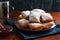 New Orleans Style Beignets, Fritters with Powdered Sugar and Raspberry Sauce