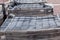 New paving slab on pallets, building materials for the reconstruction of the pavement. Selective focus, close-up