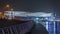 New pedestrian bridge over the Dubai Water Canal illuminated at night timelapse. United Arab Emirates, Middle East
