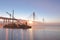 The New Port Mann Bridge and boat lifting crane at sunrise