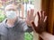 New realities of communication in the world covered by the coronavirus pandemic. Elderly people in medical masks