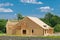 New residential frame house under construction plywood roof wall modern