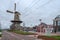 A new road and a tramway along the old city windmill de Roos in Delft, the Netherlands