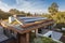 new roof with solar panels and skylights, showcasing the future of energy-efficient homes