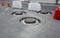 New round iron manholes on the road, rebuilding manhole chimneys on the driveway to lower the