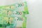 New russian banknotes on white background. two hundred roubles. Cash paper money