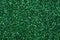 New shiny glitter texture in expensive green tone, adorable Christmas background.