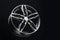 new shiny sports alloy wheel in the shape of a star, copy space