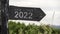 New Start 2022 written on a wooden sign