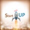 New StartUP Text With Flying Rocket.