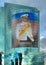 The new Thai king giant image on glass facade of modern building on river side of Chao Phraya river in Bangkok, Thailand 14.08.201