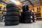 New tires, Car tires at warehouse. Automobile industry