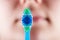 New tooth brush on the background of the person