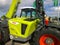New tractor telehandler CLAAS Scorpion 746 in agricultural machinery exhibition. Venue for farmers business. Manufacturing