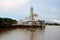 New under construction Islamic floating mosque with two domes at Sarawak river waterfront Kuching Malaysia