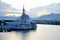 New under construction Islamic floating mosque with two domes at Sarawak river waterfront Kuching Malaysia