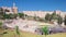 New urban Teddy Park and Tower of David on background under blue sky timelapse hyperlapse in Jerusalem, Israel.