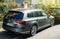 New Volkswagen Passat wagon car parked in city