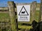 New warning sheep grazing sign. This protects grazing sheep lambs and advises dog owners in Sussex hills to put animals on leash