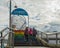 New Westminster BC rainbow coloured staircase leading to River Market. Bridge over railways with colorful staircase