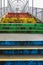 New Westminster BC rainbow coloured staircase leading to River Market. Bridge over railways with colorful staircase