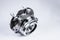 New Wheel hub assembly with bearing. This is part of the car suspension on a gray background with a gradient. The