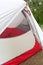 New white camping tent entry closeup.