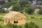 New wooden cottage of natural lumber materials with steep plank