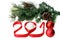 New Year 2018. Red 3D numbers with fir tree, ribbons and balls on a white background.