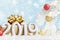 New year 2019 greeting card. Holiday decorations and snowy fir tree