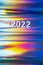 New Year 2022 number on the trendy colorful neon holographic background with polarization effect.